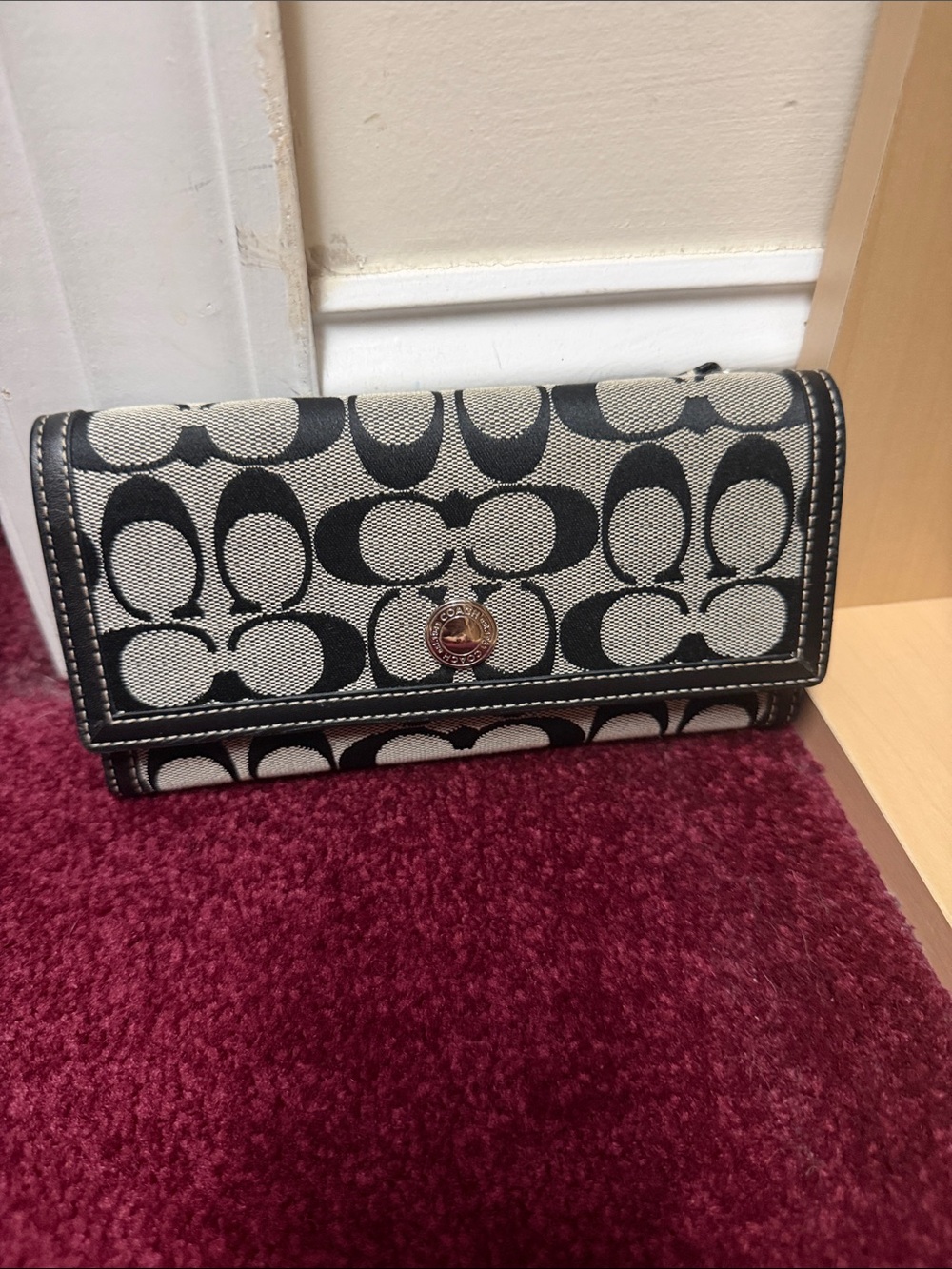 Coach Black and Cream Signature Foldover Wallet